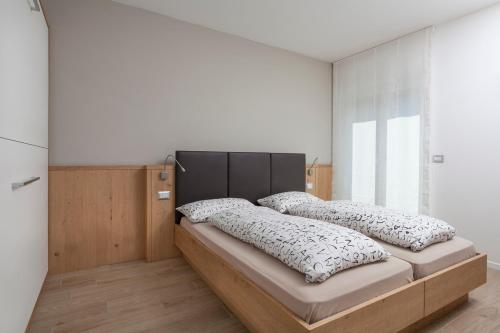 Postel nebo postele na pokoji v ubytování Appartamento Mirabell