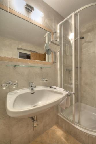 Ένα μπάνιο στο Ferienhaus Bergkristall