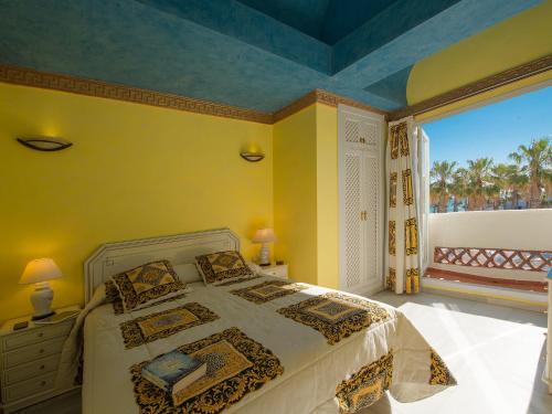 Cama o camas de una habitación en Puerto Marina Beach & Golf