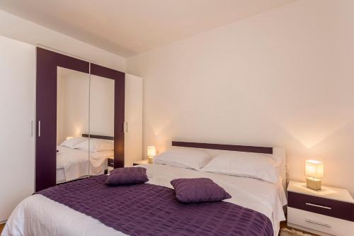 Posteľ alebo postele v izbe v ubytovaní Apartment Lukic