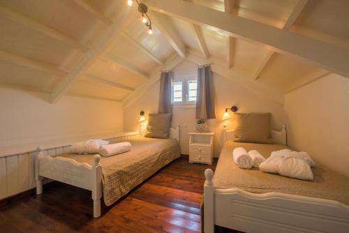 Кровать или кровати в номере Moongarden Resort