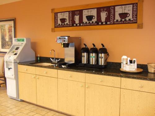 a kitchen with a counter with a coffee maker at Westgate Branson Woods Resort in Branson