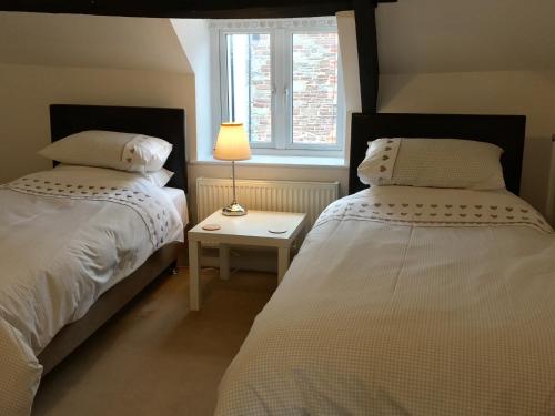 Ένα ή περισσότερα κρεβάτια σε δωμάτιο στο March Cottage Brecon