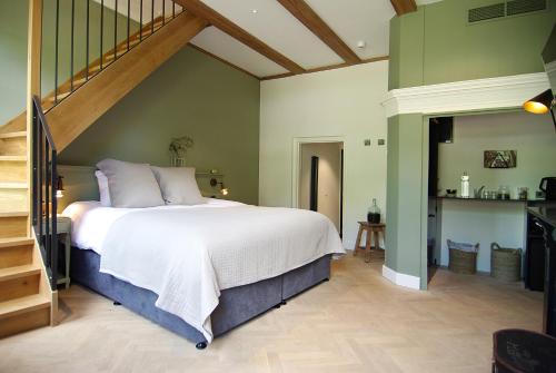 Letto o letti in una camera di Authentic Farmhouse - De Vergulden Eenhoorn