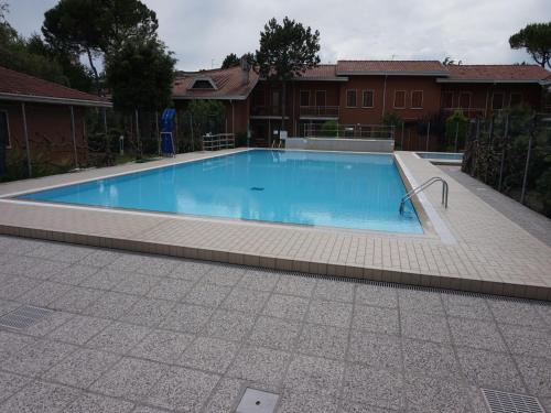 Bazén v ubytování Residence Giardino nebo v jeho okolí