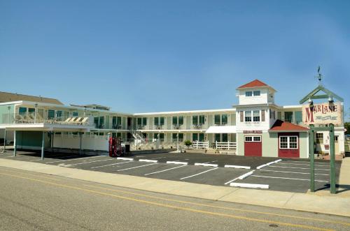 an empty parking lot in front of a building at Marlane Motel in Wildwood