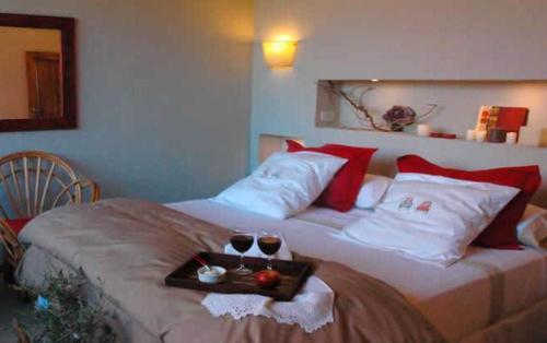 Ένα ή περισσότερα κρεβάτια σε δωμάτιο στο Hotel Spa Terrazas del Uritorco