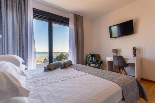 Postel nebo postele na pokoji v ubytování Villa Blue Hill