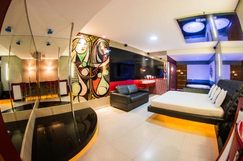 TV a/nebo společenská místnost v ubytování Arte Motel (Adults Only)