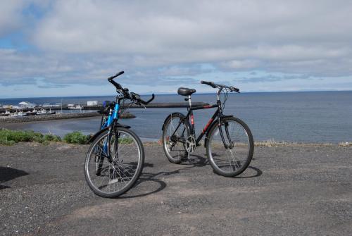 two bikes parked next to each other on a beach at Bikers Paradise in Ólafsvík