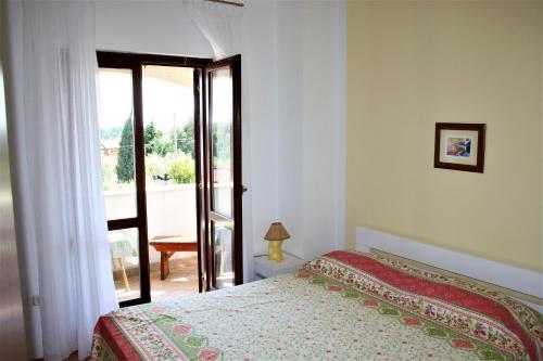 Ένα ή περισσότερα κρεβάτια σε δωμάτιο στο Holiday Home Magnolia