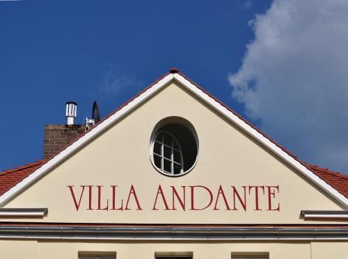 a sign on the top of a building at Villa Andante Apartmenthotel in Kassel