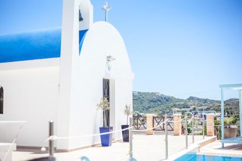 a view from the roof of a building with a pool at Castello Di Cavallieri Suites & Spa - Adults Only in Faliraki