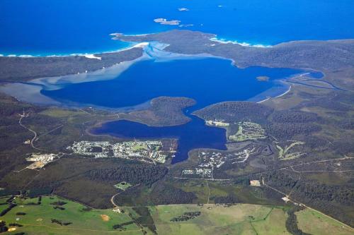 an aerial view of a lake and islands at Coalmine Beach Holiday Park in Walpole
