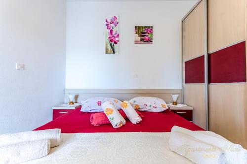 Postel nebo postele na pokoji v ubytování Apartments Nives Suhi Potok