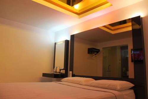 Postel nebo postele na pokoji v ubytování Time Hotel
