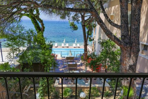 a view of the ocean from the balcony of a hotel at Melis Hotel Kusadasi in Kusadası
