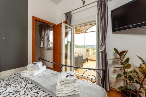 Postel nebo postele na pokoji v ubytování Holiday Home Oasis Hyllis
