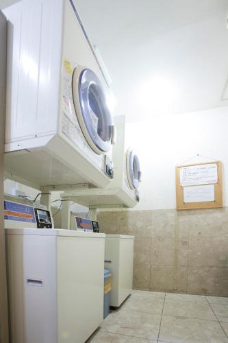 a laboratory with two microwaves in a room at Tetoranze Makuhari Inagekaigan Hotel in Chiba