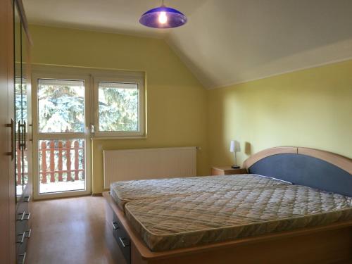 Voodi või voodid majutusasutuse Apartment Altorjai toas