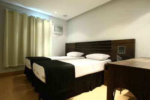 Postel nebo postele na pokoji v ubytování Palais Hotel