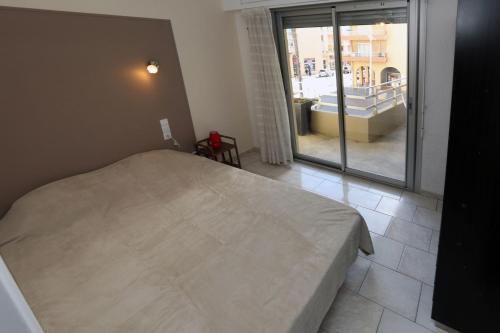 Кровать или кровати в номере Superbe Appartement Vue mer