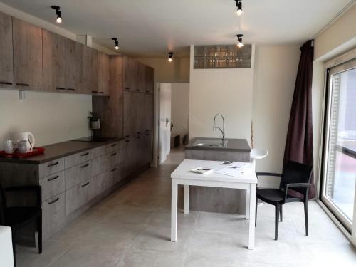 Kuchyň nebo kuchyňský kout v ubytování Vakantieverblijf Volmolen B&B