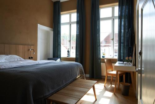 Tempat tidur dalam kamar di Alte Apotheke