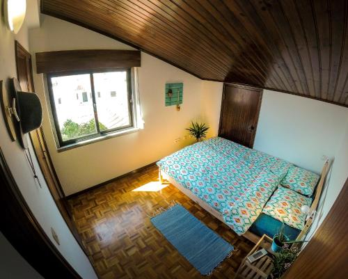 Ein Bett oder Betten in einem Zimmer der Unterkunft My Powderwave Ericeira