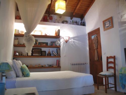 Postel nebo postele na pokoji v ubytování Casa dos Cactos