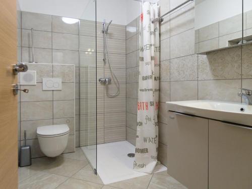 Koupelna v ubytování Apartments Reida