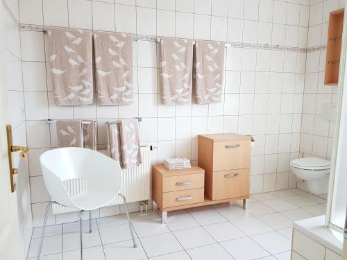 Vonios kambarys apgyvendinimo įstaigoje Villa Weitblick