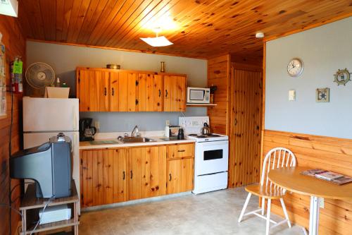 ครัวหรือมุมครัวของ Blue Crest Cottages