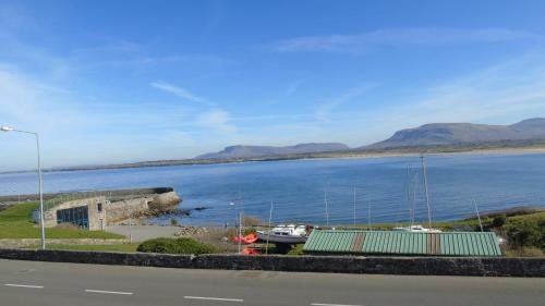 a view of a body of water with boats in it at Seacrest Guesthouse in Mullaghmore