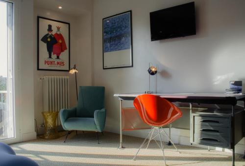 TV a/nebo společenská místnost v ubytování Boutique Hotel Trieste - Adults Only