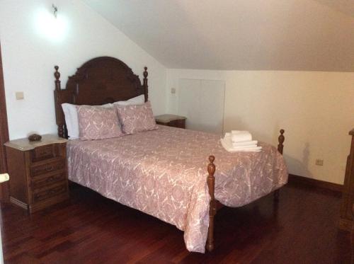 Ένα ή περισσότερα κρεβάτια σε δωμάτιο στο Quinta da Ribeirinha