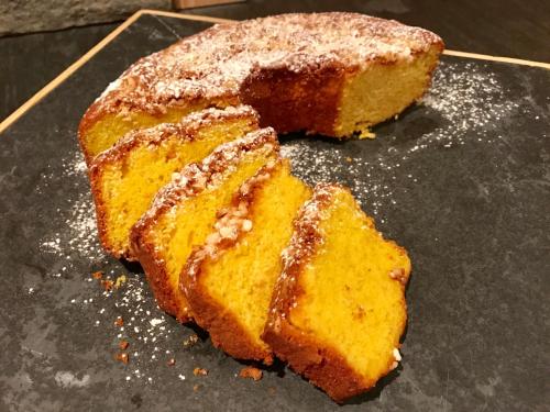 a piece of cake sitting on top of a table at Hotel Arnaria in Ortisei