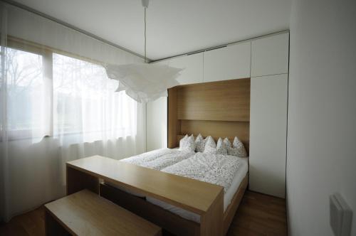 Ένα ή περισσότερα κρεβάτια σε δωμάτιο στο Design Apartment in Park