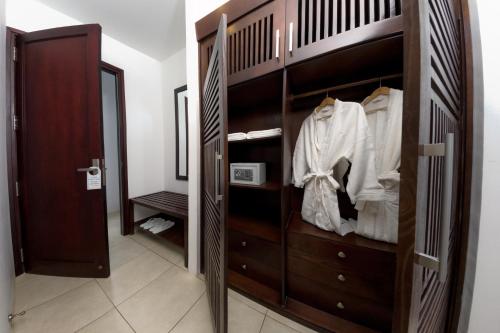a bedroom with a bunk bed and a closet at Surf4You Residence in Mui Ne