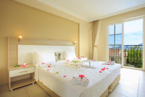 En eller flere senge i et værelse på Milkyway Apart & Hotels