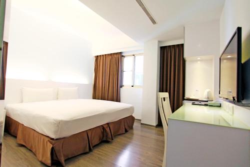 TV a/nebo společenská místnost v ubytování Taitung Yes Hotel