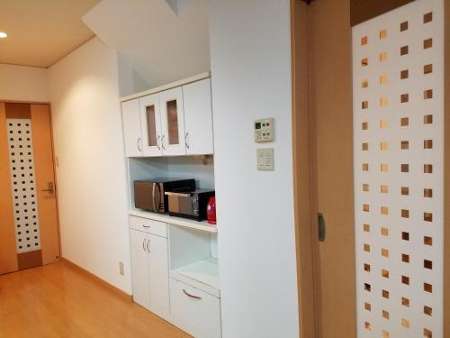 Kuchyň nebo kuchyňský kout v ubytování Villa M Guesthouse