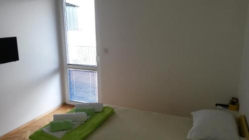 Krevet ili kreveti u jedinici u okviru objekta Apartmani Drašković