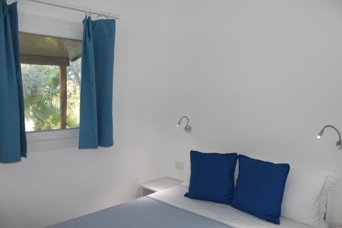 Postel nebo postele na pokoji v ubytování Residence Serrone