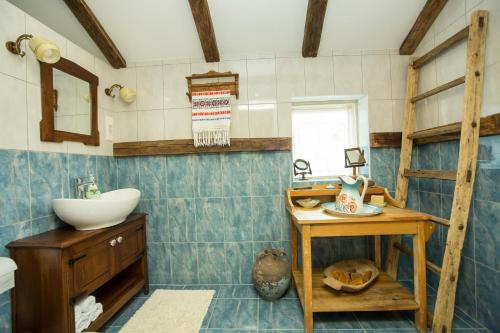 Een badkamer bij Country House Stara Kapela