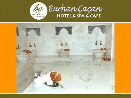 a picture of a bathroom with toilets in it at BC Burhan Cacan Hotel & Spa & Cafe in Istanbul