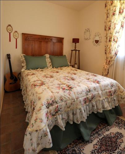 Postel nebo postele na pokoji v ubytování Podere Casalsole