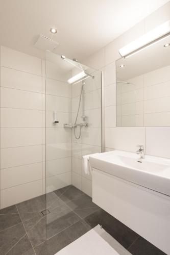 Ένα μπάνιο στο Appartements Insieme