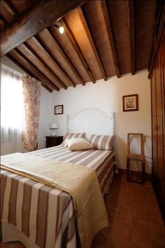 Postel nebo postele na pokoji v ubytování Podere Casalsole