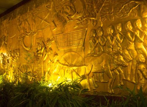 a wall with a painting on it at PAMA Hotel in Kampong Chhnang